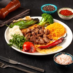 Çöp Şiş (Özel marine edilmiş kuzu but eti, bulgur pilavı ve garnitürler ile servis edilir)
